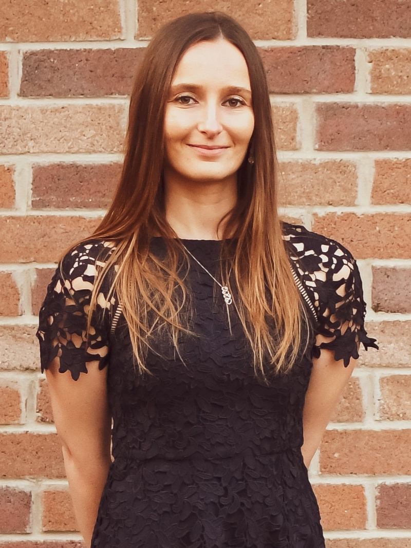 woman wearing dark blue dress